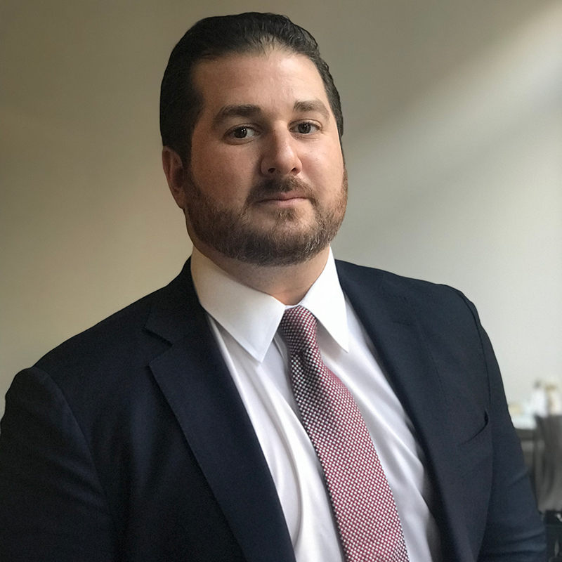 Attorney Daniel Rehns in a suit