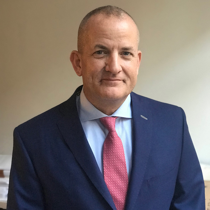 Attorney Gregory Hach in a suit